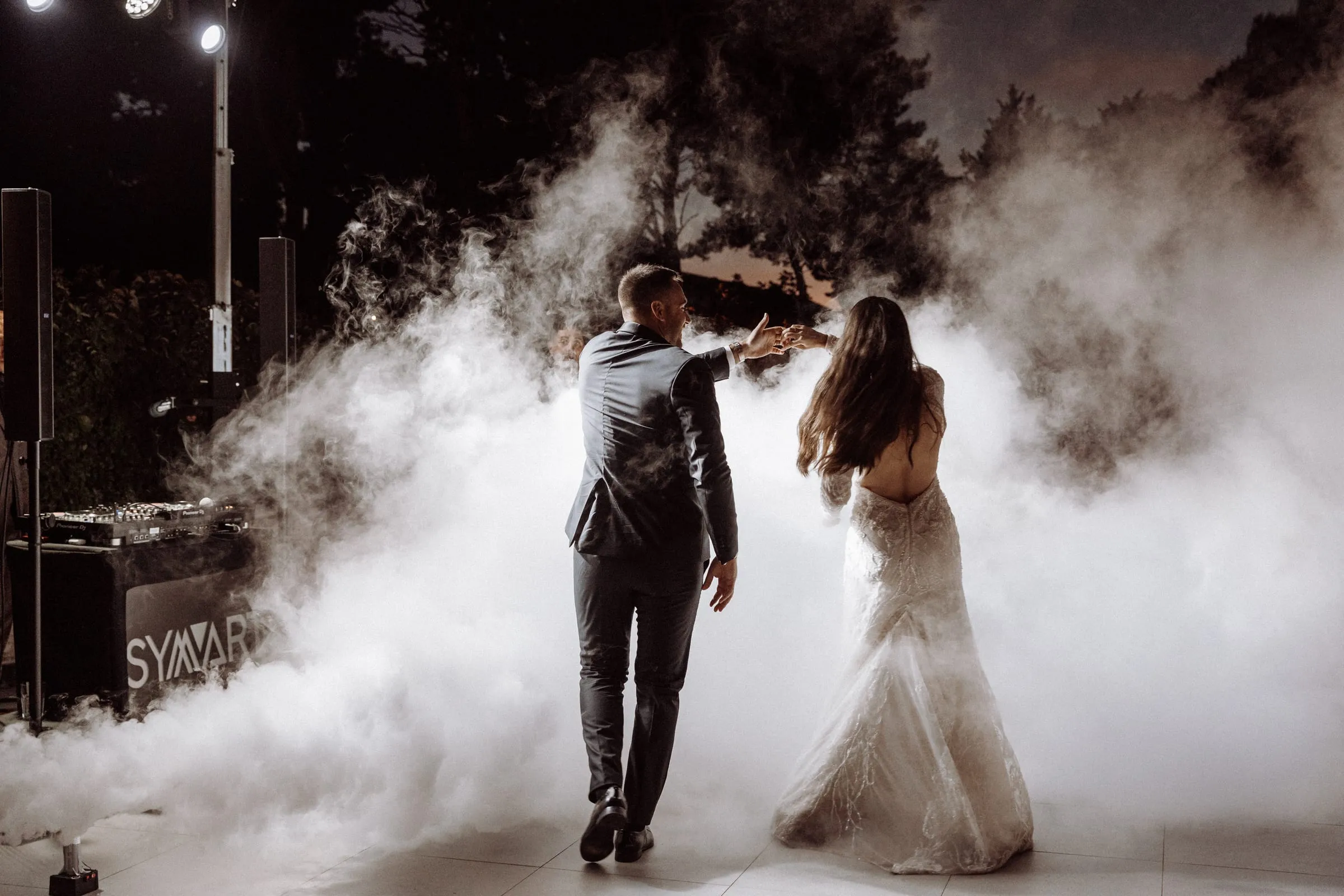 A first dance in low fog at a wedding on the island of Brač